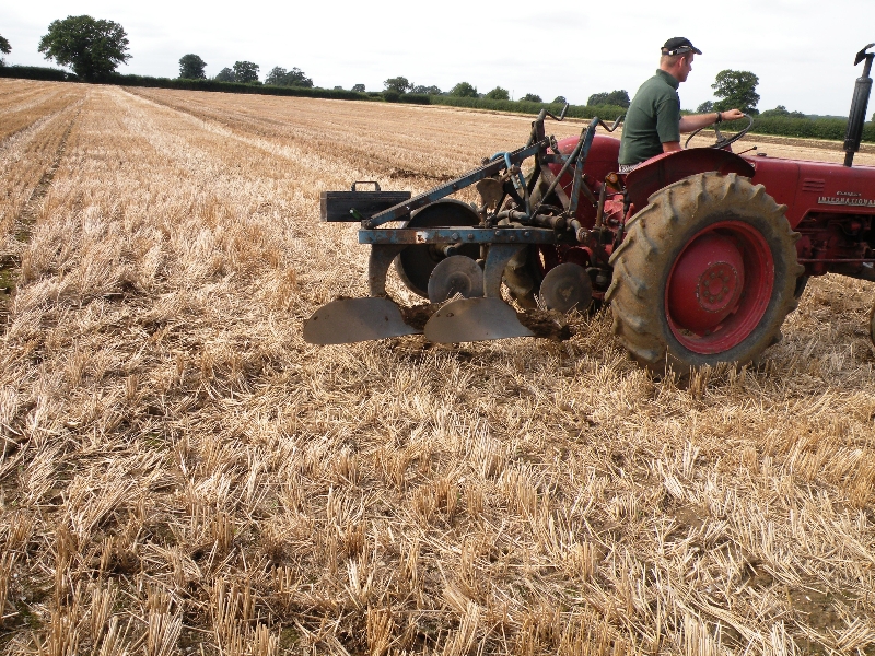 chris-legg-with-his-international-b250-1956-using-a-very-rare-ford-epg3-2-furrow-plough-2