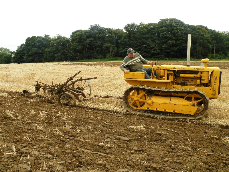 roy-grief-on-his-1941-caterpillar-d2-with-a-3-furrow-plough-2