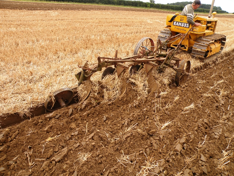 roy-grief-on-his-1941-caterpillar-d2-with-a-3-furrow-plough-3