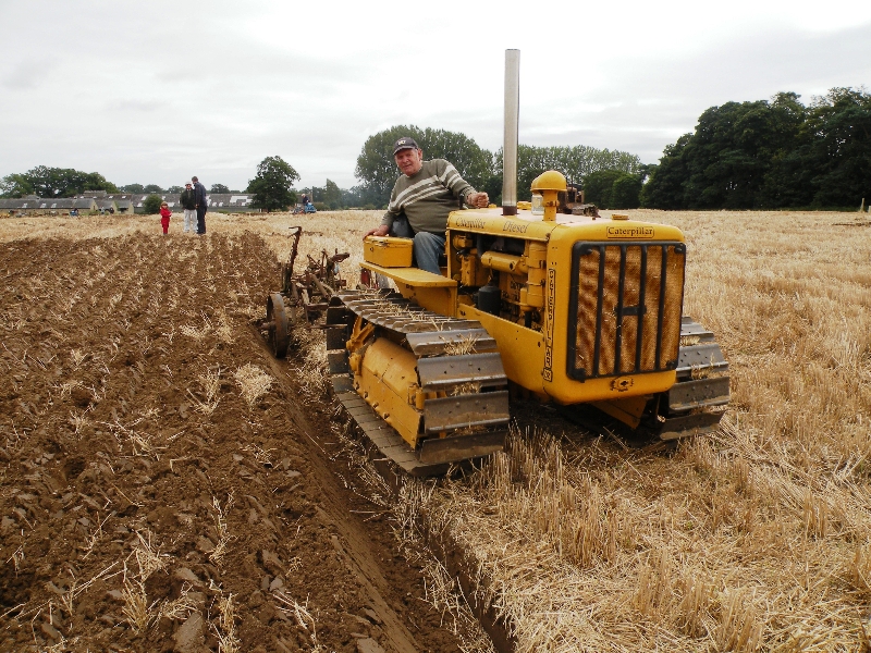 roy-grief-on-his-1941-caterpillar-d2-with-a-3-furrow-plough