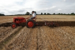 daniel-mycock-on-his-1950-allis-chalmers-b-pulling-an-oliver-2-furrow-trailing-plough-3