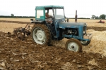 david-askew-on-his-1964-super-major-pulling-a-ransome-2-furrow-trailed-plough