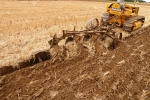 roy-grief-on-his-1941-caterpillar-d2-with-a-3-furrow-plough-3