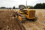 roy-grief-on-his-1941-caterpillar-d2-with-a-3-furrow-plough
